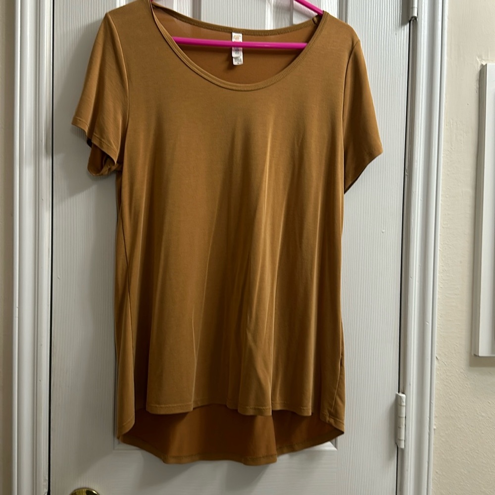 Medium, tunic style LulaRoe top. Spicy Mustard color